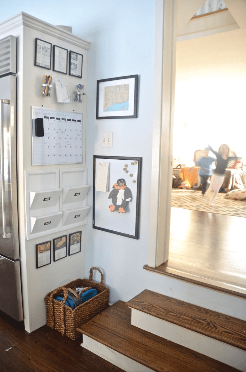 A family command center is a perfect way to organize a busy family! These DIY family command center ideas will help you organize and keep track of your mail, calendars, kid’s homework, backpacks, and school papers! Get your house and life organized for back to school now with these inspiring family command centers for your kitchen or office! I love this idea by at Charlotte's house! #organization #organizing #familycommandcenter 