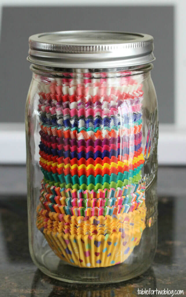 I’m always looking for easy kitchen organization ideas, and these DIY budget-friendly tips! Table for Two shows that there isn’t anything a Mason jar can’t do with this unique organization idea! #KitchenOrganization #KitchenOrganizationDIY #kitchentips #kitchenideas #organization #organizationideas 