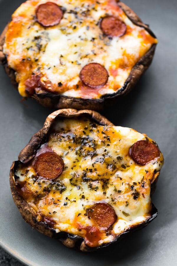 Keto Stuffed Mushrooms! Love an easy keto stuffed mushroom appetizer & dinner! Whether you prefer sausage, cream cheese, ground beef, turkey, Italian sausage or spinach stuffed mushrooms, low carb portabella pizzas or the best bacon-wrapped cream cheese stuffed mushrooms I guarantee you’ll find a new favorite! If you’re a keto beginner (or an old pro:) you will love this collection of keto stuffed mushrooms! #keto #ketorecipes #lowcarb #healthy #mushroomrecipes #stuffedmushrooms  
