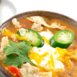 Keto Taco Soup | This easy Keto Taco Soup recipe makes a fabulous low carb dinner that won’t break your budget! Family friendly, low carb Keto Taco Soup is ready in under 30 minutes (stovetop) or slow cooked to perfection in the crockpot! Ground beef, cream cheese and a few simple seasonings combine to create an amazing & creamy taco soup with less than 5 net carbs per serving! #keto #ketorecipes #crockpot