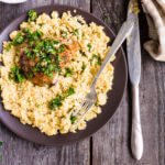 Easy Keto Cauliflower Rice! Delicious, creamy & healthy low carb cauliflower rice makes dinner meals complete! Make this easy keto recipe tonight & prepare to be amazed! Keto cauliflower rice is super easy to prep & is the perfect low carb side dish with only 2 carbs! Find out how to make it with your food processor to save time! #keto #ketorecipes #lowcarbrecipes #healthy