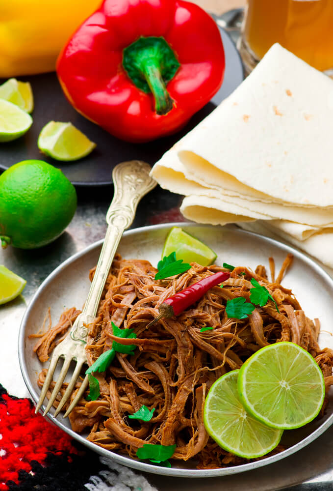 Keto Crockpot Carnitas | Looking for an easy keto dinner recipe that’s budget friendly? This low carb carnitas recipe transforms pork into a keto-friendly family dinner with authentic Mexican flavor! Whether you’re looking for Mexican keto recipes for your pressure cooker quick or slow cooking crockpot recipes for meal prep day this keto carnitas recipe will not disappoint with only 5 net carbs per serving! #keto #ketorecipes #crockpot #InstantPot