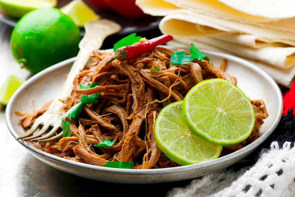 Looking for a keto dinner recipe that’s low carb high in flavor & easy to prep for your crockpot? Check out this Keto Crockpot Carnitas recipe! Authentic pulled pork with 5 net carbs! Everyone will love this easy keto recipe that’s perfect for ketogenic diet beginners-no special ingredients necessary! You can’t beat a slow cooking keto meal made easy in the crockpot! #keto #ketocarnitas #ketorecipes #ketodinner #lowcarb #lowcarbrecipes #crockpot #crockpotrecipes #InstantPot #slowcooker 