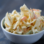 Sweet & Spicy Keto Coleslaw: 2 Ways To Make The Perfect Low Carb Slaw | The must have low carb, keto side dish for summer is this keto coleslaw recipe! With two easy recipes, one with mayo & one without, you can’t go wrong with this sweet & simple keto coleslaw with no sugar added! Sour cream, ranch seasonings, jalapenos & cilantro bring a flavorful kick to this healthy coleslaw recipe! #keto #ketorecipes #lowcarb #coleslaw #sidedish