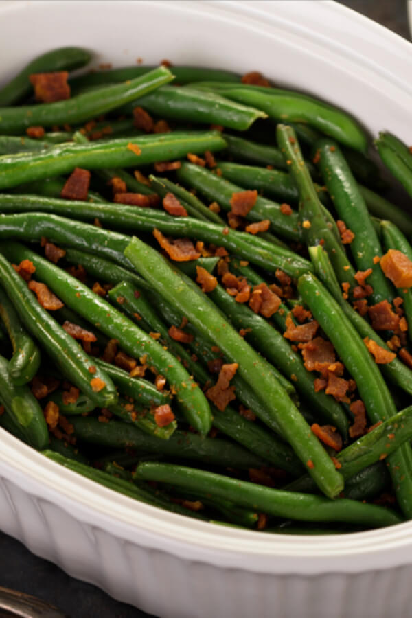 Green Beans With Bacon! Need a keto side dish for dinner? This recipe for Green Beans with Bacon is my favorite low carb side on the keto diet! Fresh green beans with bacon, pan roasted & sauteed with lemon & butter makes an easy keto side dish recipe that’s healthy, low carb & ready in 15 minutes! Learn how to make best Southern style green beans with bacon! #keto #ketorecipes #lowcarb #lowcarbrecipes #sidedish #ketosidedish #lowcarbvegetables