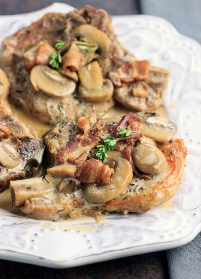 Keto Instant Pot Recipes - Smothered Pork Chops via Beauty And The Foodie 