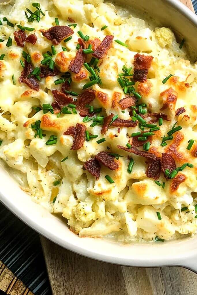 Need an easy side dish? This Loaded Cauliflower Casserole is the best low carb keto side dish recipe for dinner! My kids love this cheesy cauliflower casserole with bacon! If you’re looking for a new easy keto recipe for dinner or the holidays don’t miss this simple side dish! #sidedish #side #cauliflower #holiday #keto #ketorecipes #lowcarb #casserole #comfortfood