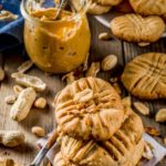 3-Ingredient Keto Peanut Butter Cookies. If you’re looking for an easy keto dessert recipe these homemade low carb peanut butter cookies are divine. With 3 ingredients this easy sugar-free cookie recipe makes gluten-free baking on the ketogenic diet simple and delicious! Make these keto peanut butter cookies in advance and freeze for the holidays or put this recipe together from start to finish in 30 minutes! Yum! #keto #ketorecipes #lowcarb #cookies #peanutbutter #glutenfree