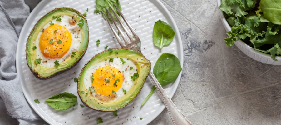 Why Avocado Baked Eggs Are The True Breakfast of Champions (Healthy Egg Stuffed Avocado Recipe)