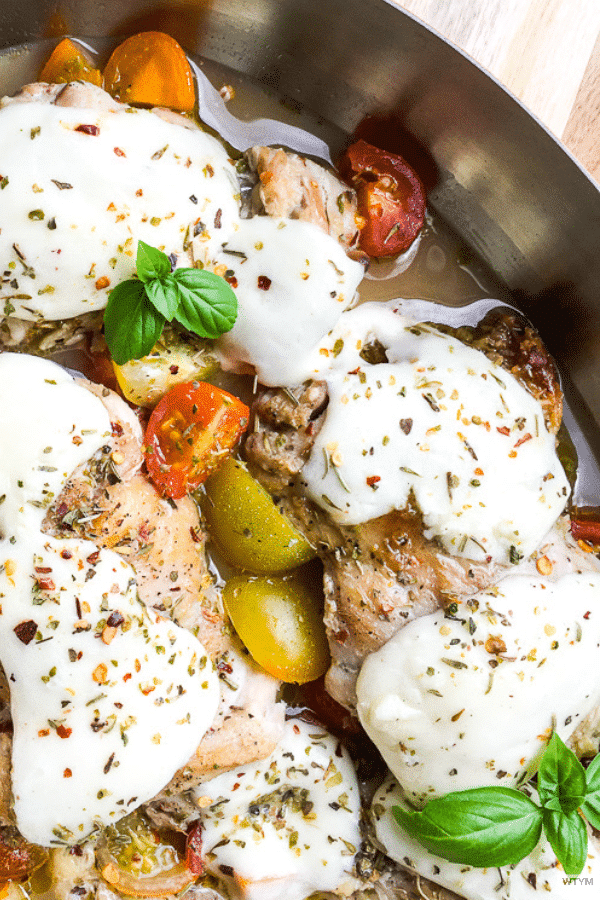 Keto Chicken Thighs with Mozzarella cheese is an easy, low carb, keto dinner recipe that's ready in 40 minutes with 1.9 net carbs per serving! Whether or not you follow a ketogenic diet, you'll love this healthy dinner recipe! #keto #ketorecipes #dinner #lowcarbrecipes #LCHF