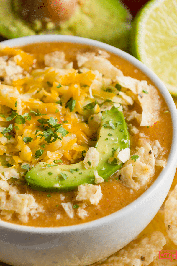 Looking for a keto dinner recipe that’s low carb high in flavor & easy to prep for the crockpot? This Keto Crockpot White Chicken chili is the best! Only 6 carbs & easy to make ahead & freeze! Everyone will love this easy keto recipe that’s perfect for ketogenic diet beginners-no special ingredients necessary! You can’t beat a slow cooking keto meal made easy in the crockpot! Yum! #keto #ketogenic #ketodiet #ketogenicdiet #ketorecipes #lowcarb #LCHF #crockpot #crockpotrecipes