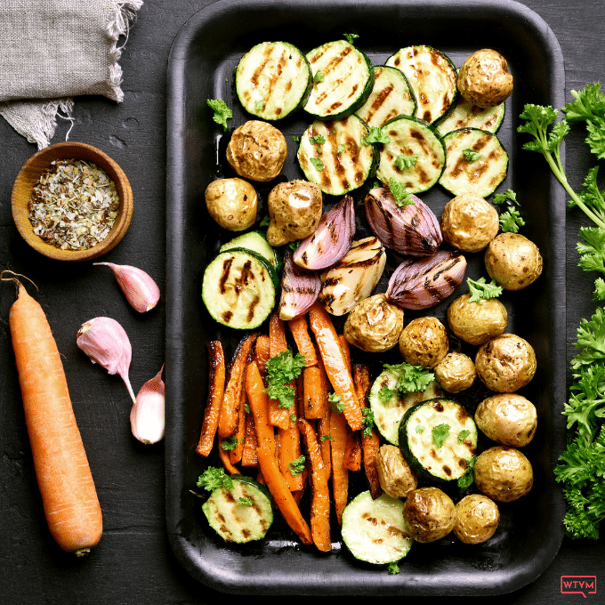 Make the BEST Rainbow Roasted Vegetables with this easy healthy recipe! Learn how to Roast Vegetables in the oven with this quick Sheet Pan method with seasoning ideas, veggie cooking tips and times, plus more recipe ideas. Healthy Oven Roasted Vegetables are a delicious side dish for any meal. Roasted Veggies are perfect for meal prep, quick weeknight meals, or serving a crowd during the holidays like Thanksgiving! Vegan + Gluten-Free +low carb options